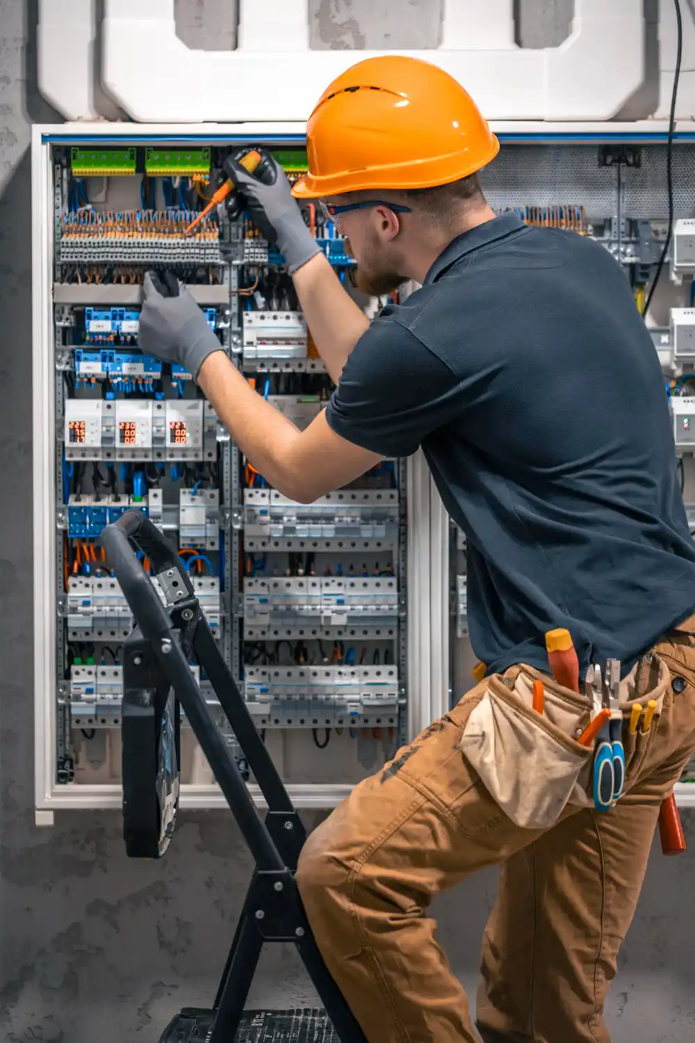 Emergency electrician repairing electrical fault in property